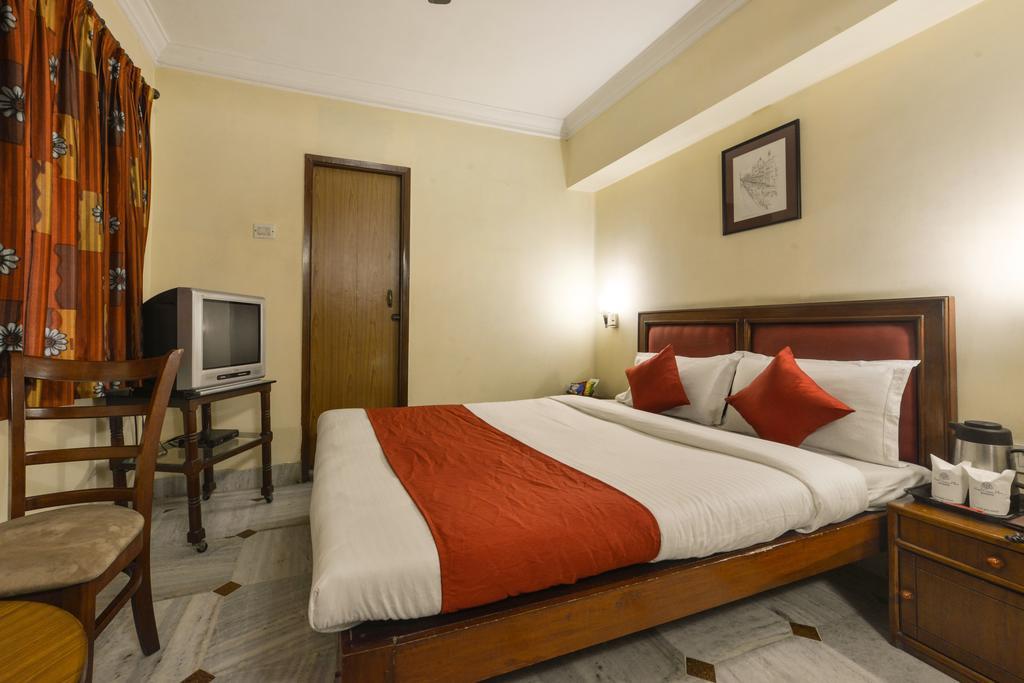 Camac Plaza Hotel Kalkutta Szoba fotó
