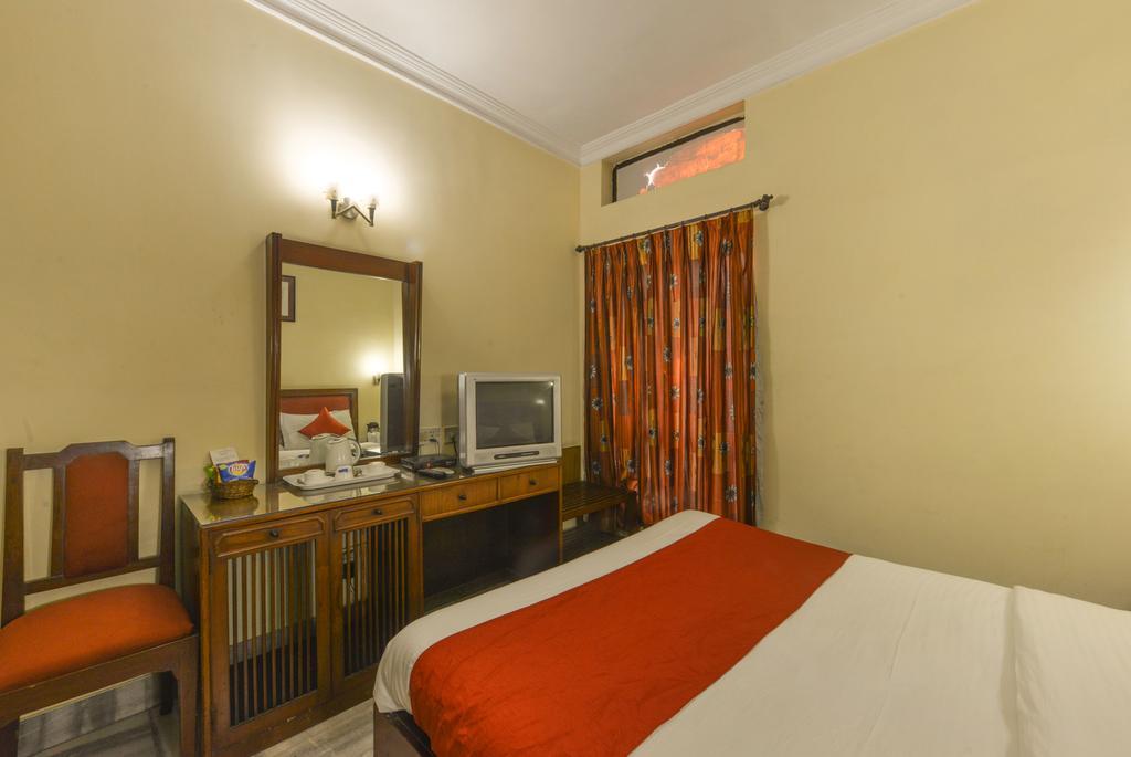Camac Plaza Hotel Kalkutta Szoba fotó